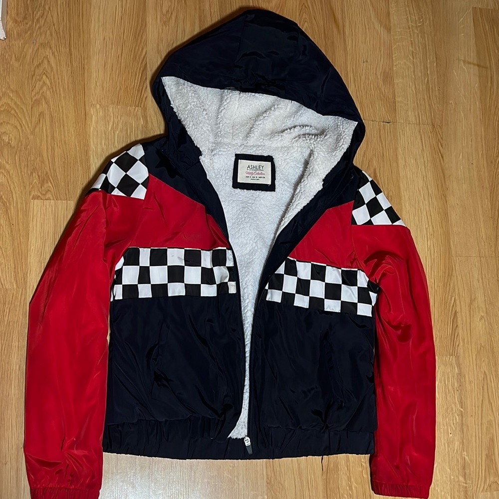 Red and blue sweater with checkered print